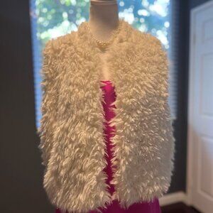 .LOVE white faux fur vest. Comes fully lined and made of soft material.